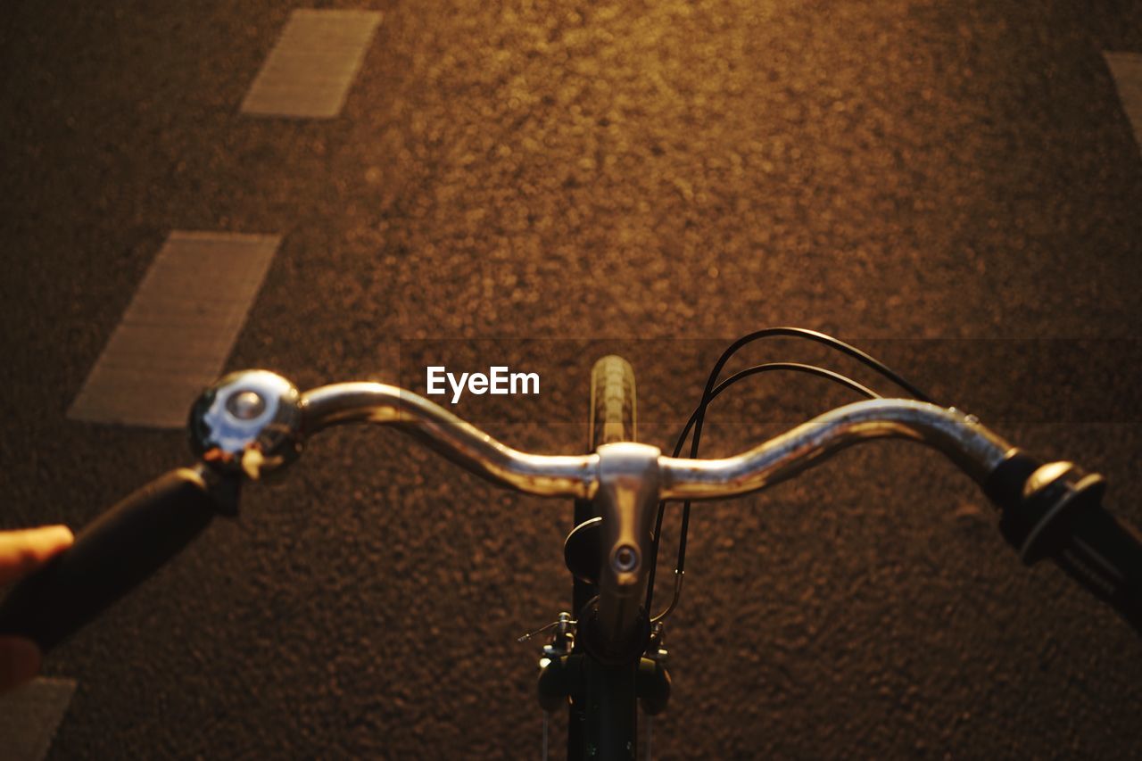 High angle view of bicycle handle on street
