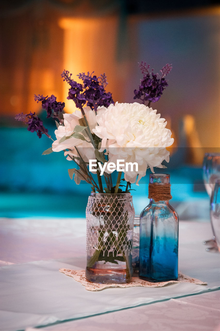 Close-up of flowers in vase on table