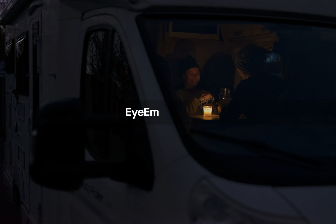 Two people sitting in car