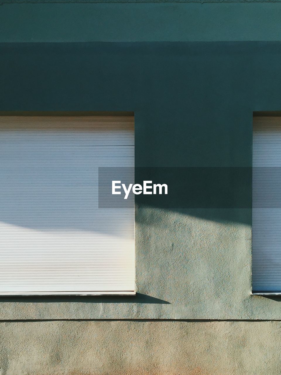 Full frame shot of building with closed windows