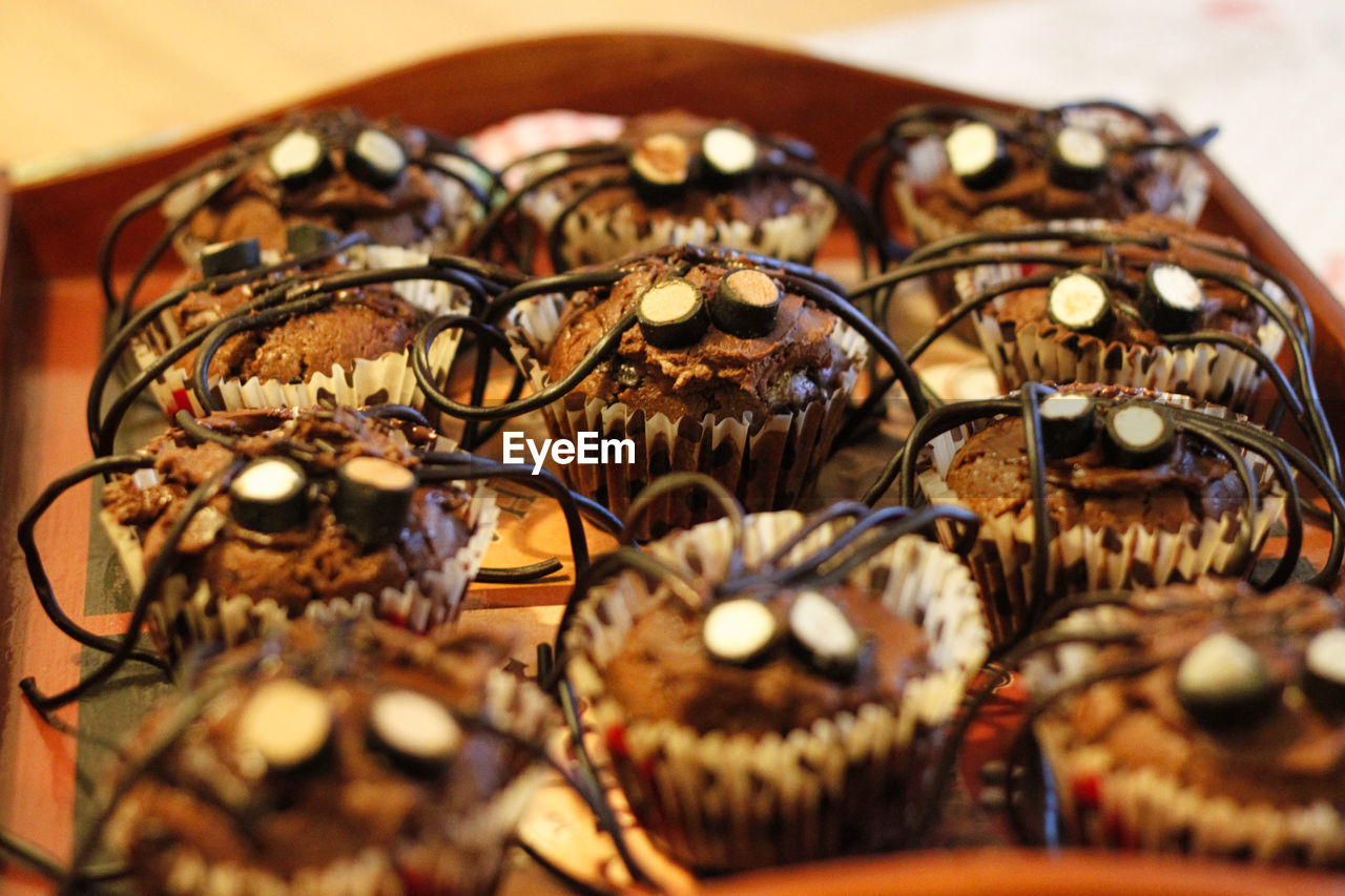 High angle view of spider muffins on table