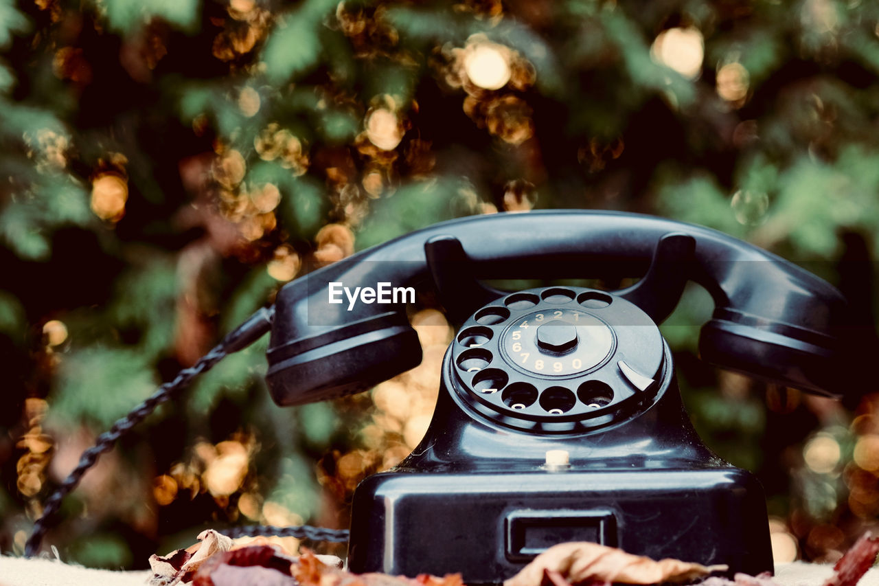 Close-up of old telephone booth