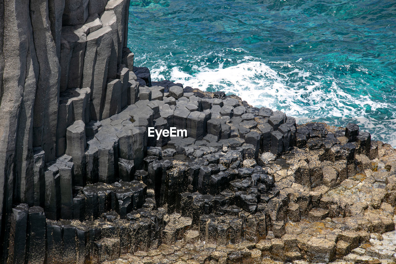 Panoramic view of sea against rock formation