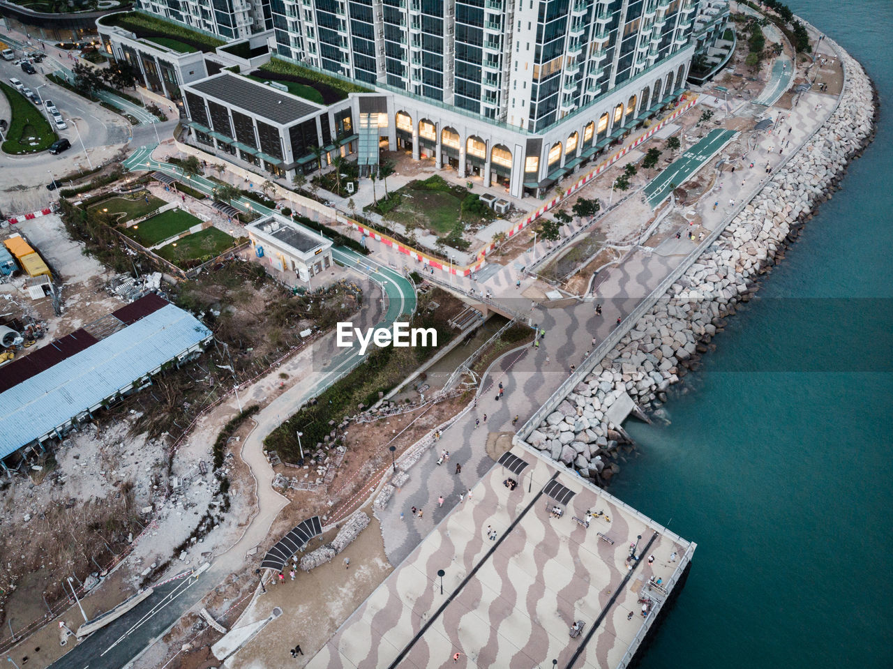 High angle view of buildings by street in city