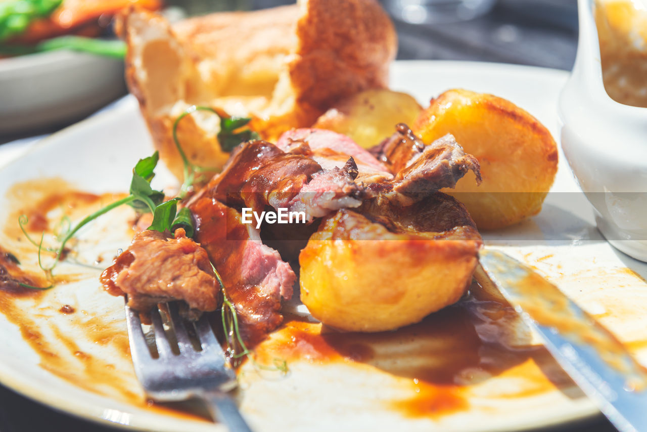 CLOSE-UP OF MEAL SERVED ON TABLE