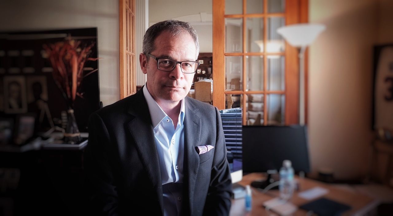 Portrait of confident businessman standing in office