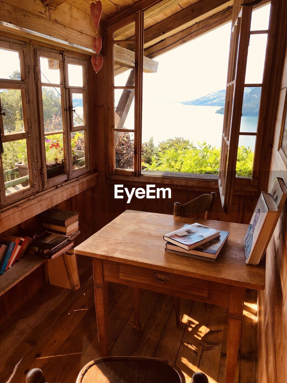 CHAIRS AND TABLE IN WINDOW AT HOME