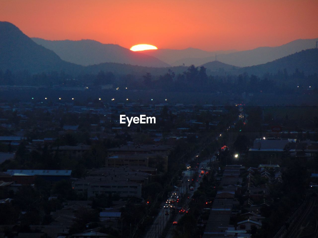 High angle view of cityscape against sky during sunset