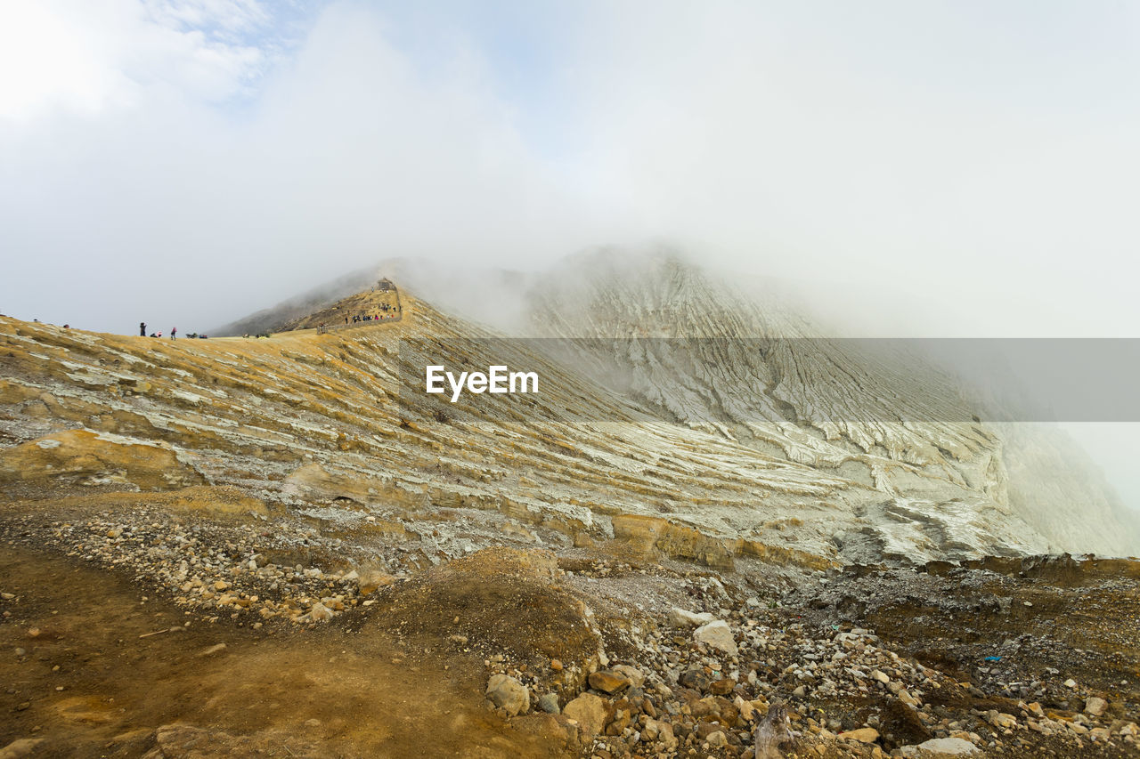 Peak of mount ijen crater in east java, indonesia covered with cloud