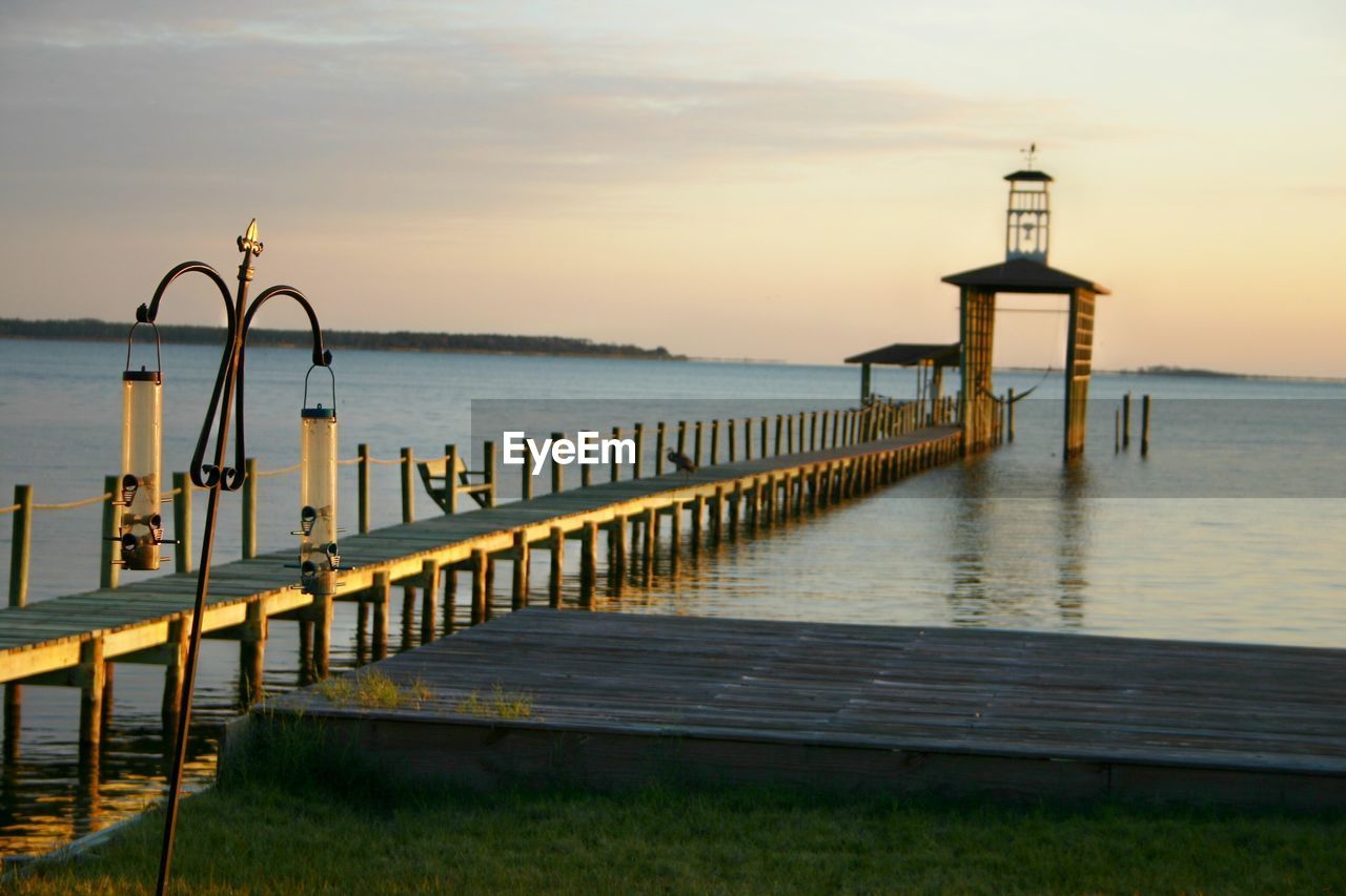 PIER OVER SEA AGAINST SKY