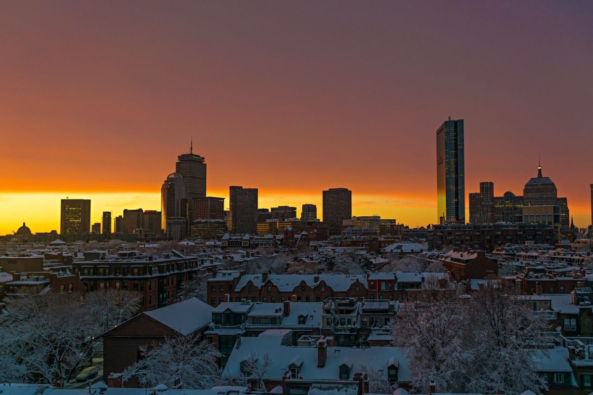 VIEW OF CITYSCAPE AT SUNSET