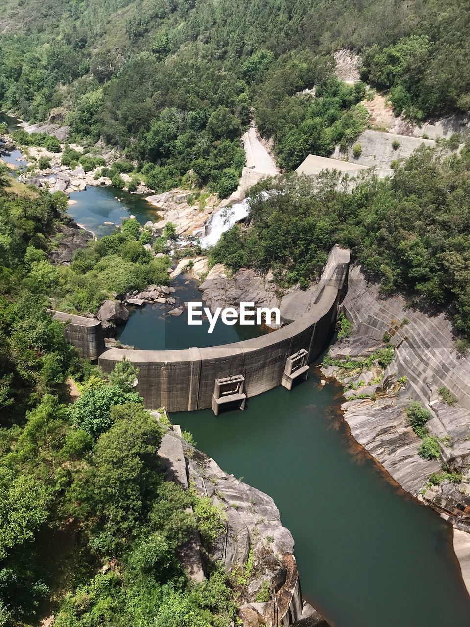 High angle view of river amidst trees