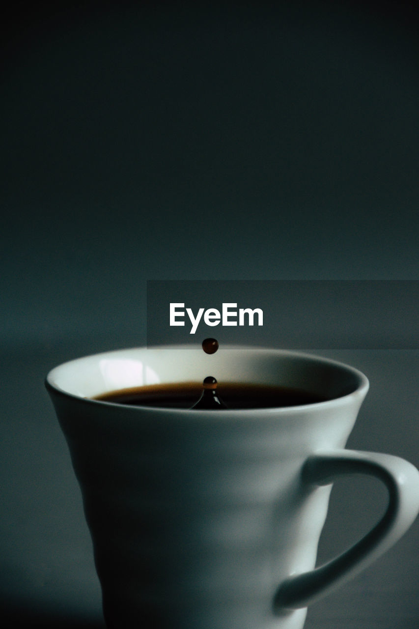 Close-up of coffee cup on table