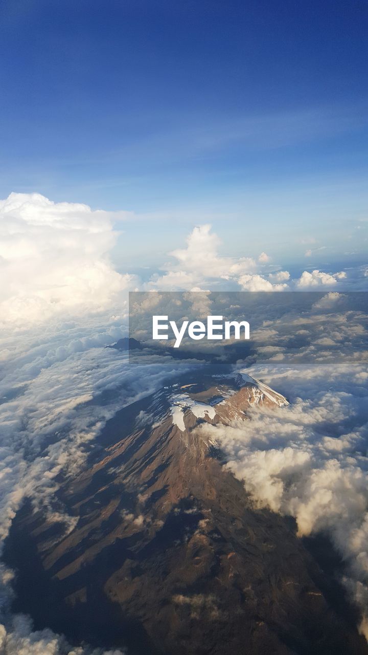 Aerial view of mt kilimanjaro against cloudy sky