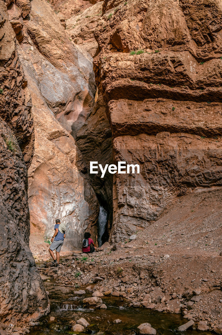 People on rock formations