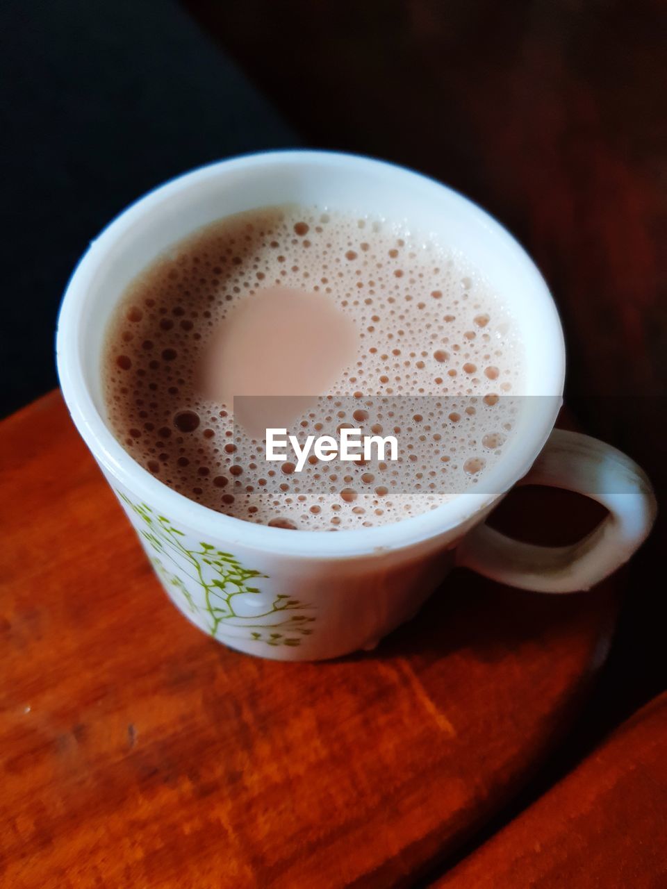 close-up of coffee cup on table