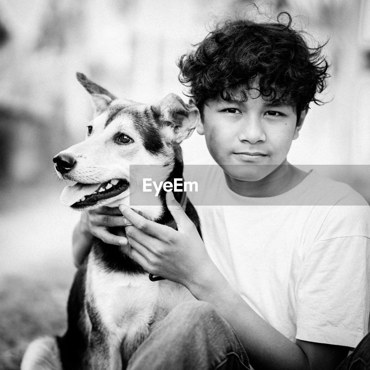 Portrait of boy with dog