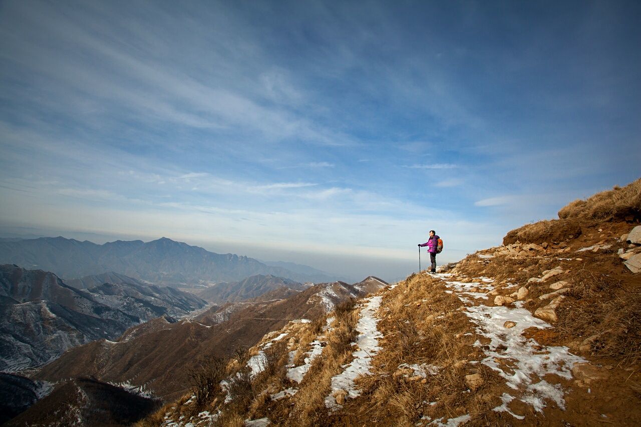 Man standing on countryside landscape