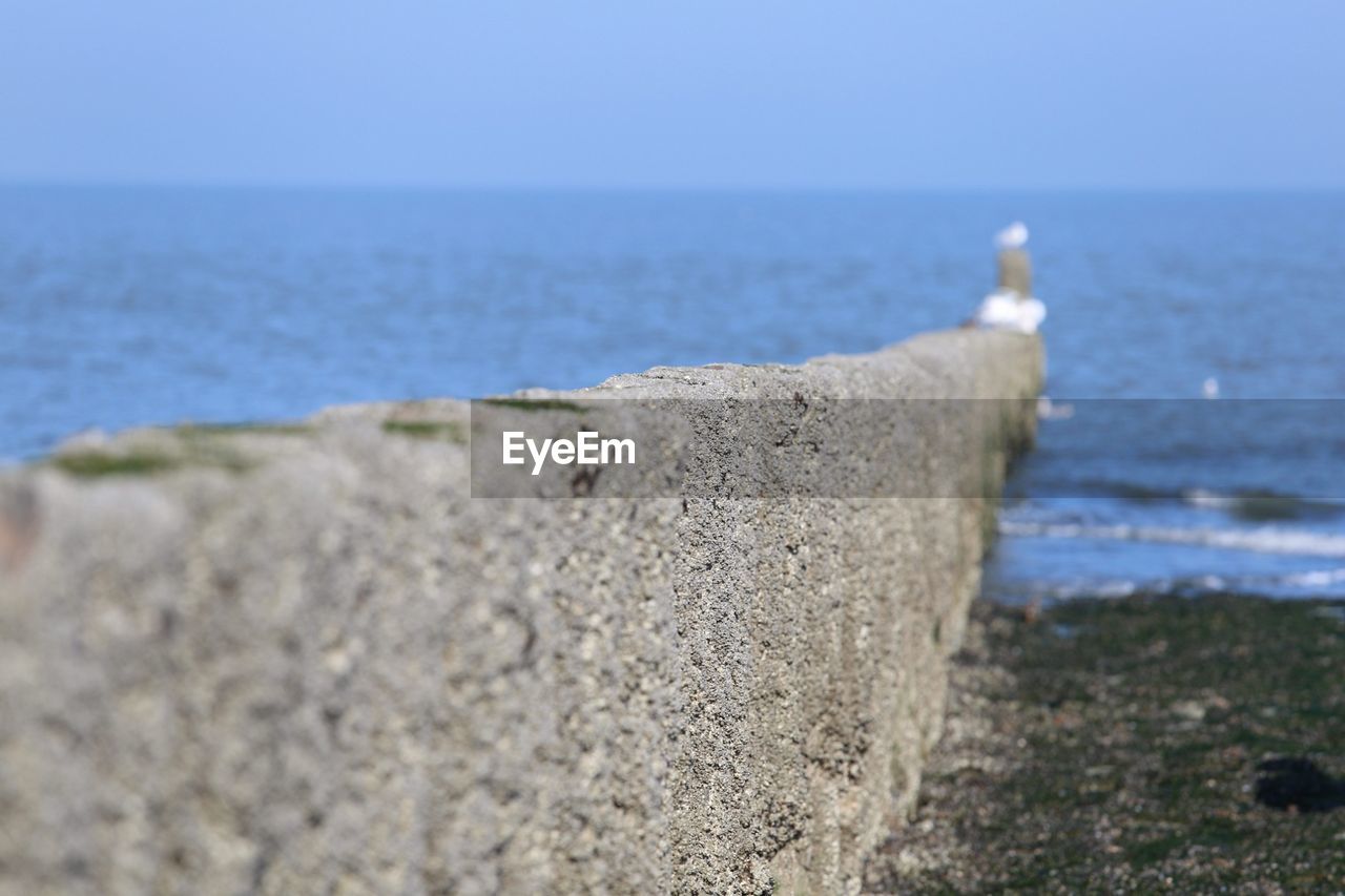 Close-up of concrete on beach