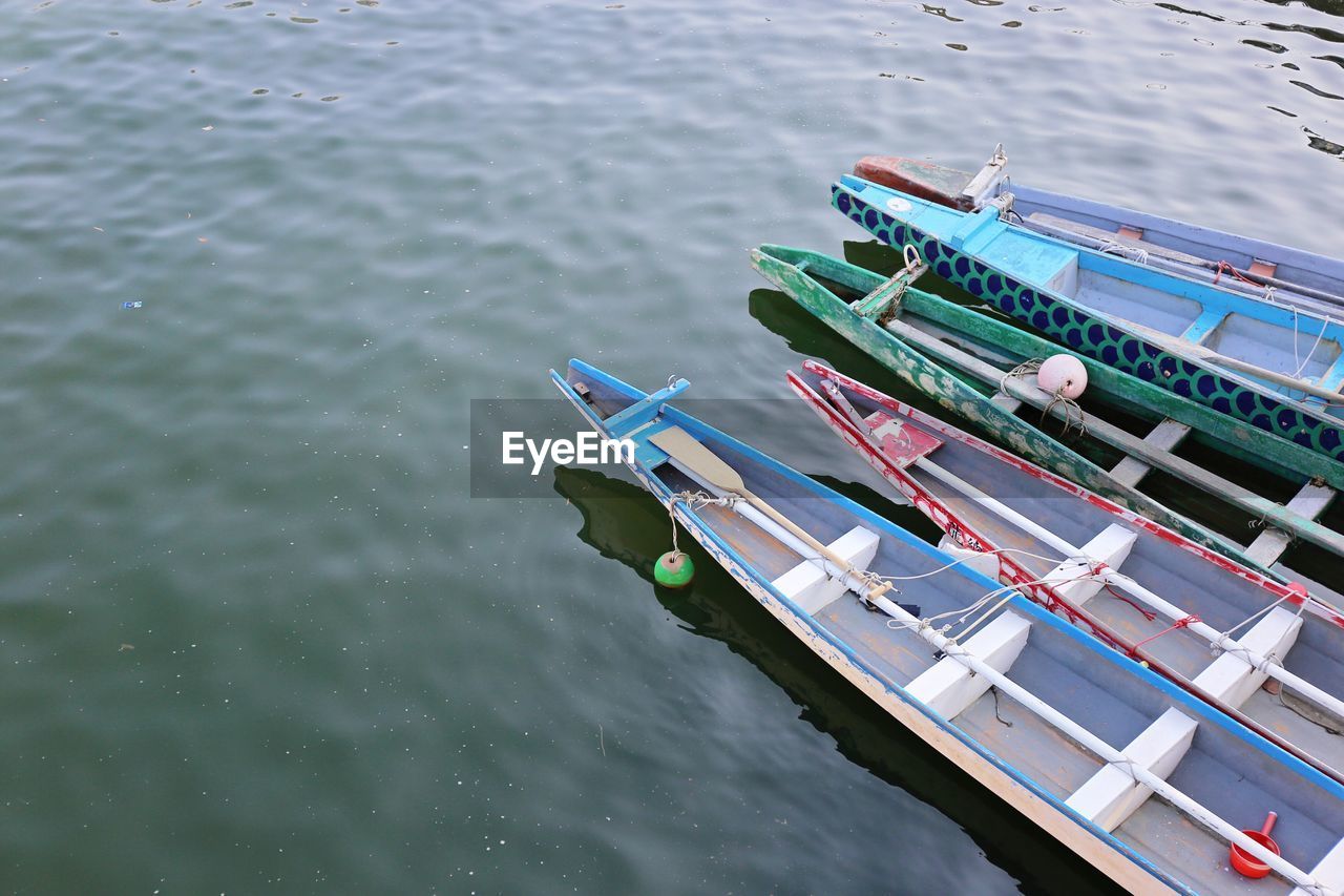 High angle view of boats moored in lake