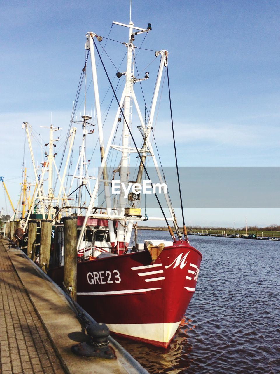 VIEW OF BOATS MOORED AT HARBOR