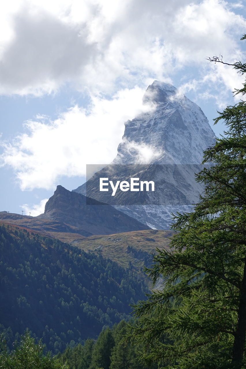 SCENIC VIEW OF VOLCANIC MOUNTAINS AGAINST SKY