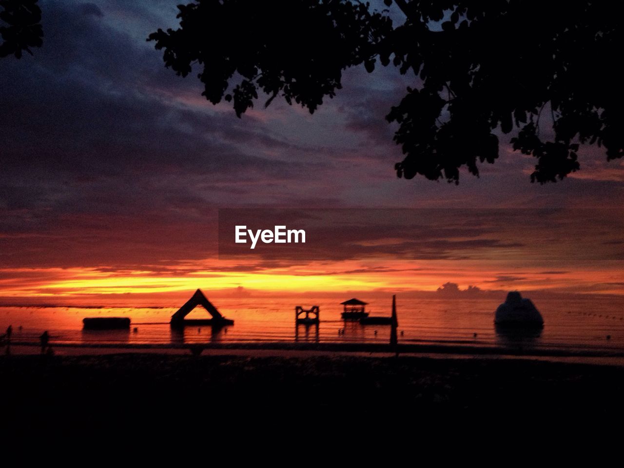 Scenic view of landscape against sky at sunset