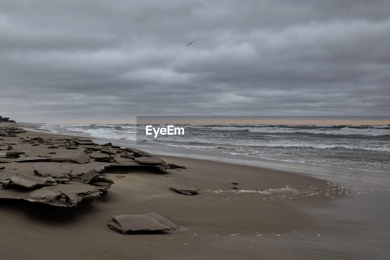 VIEW OF BEACH AGAINST SKY