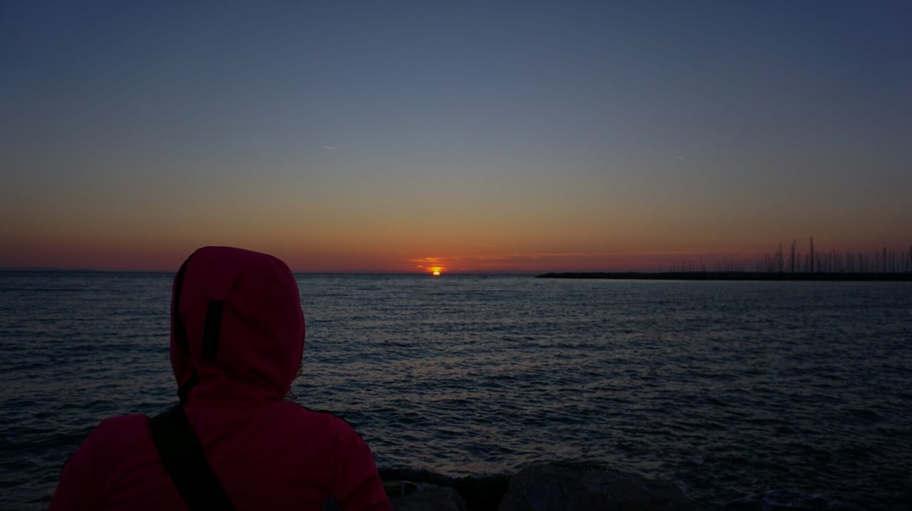 Scenic view of sea at sunset