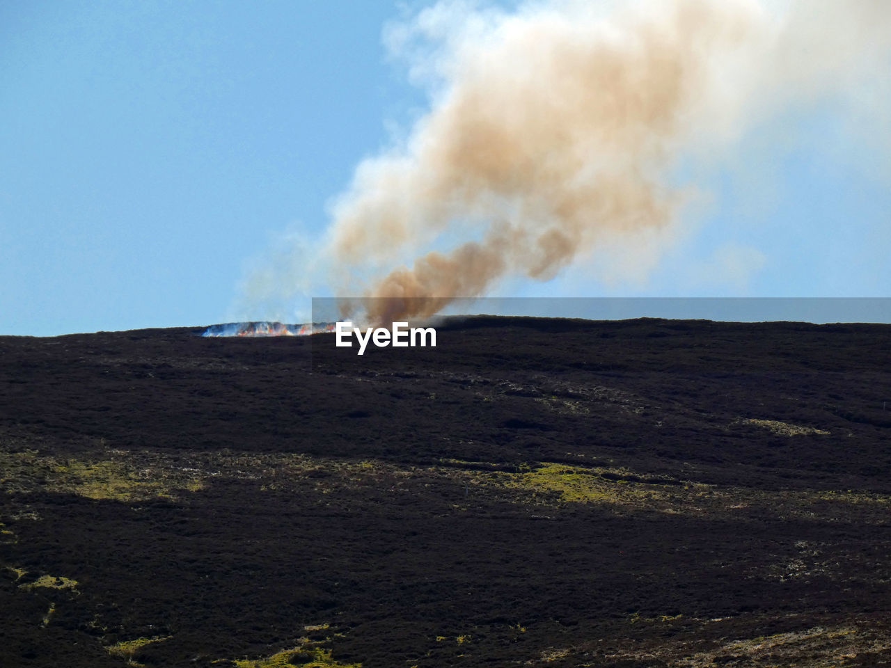 Burning brush in the hills of mennock pass