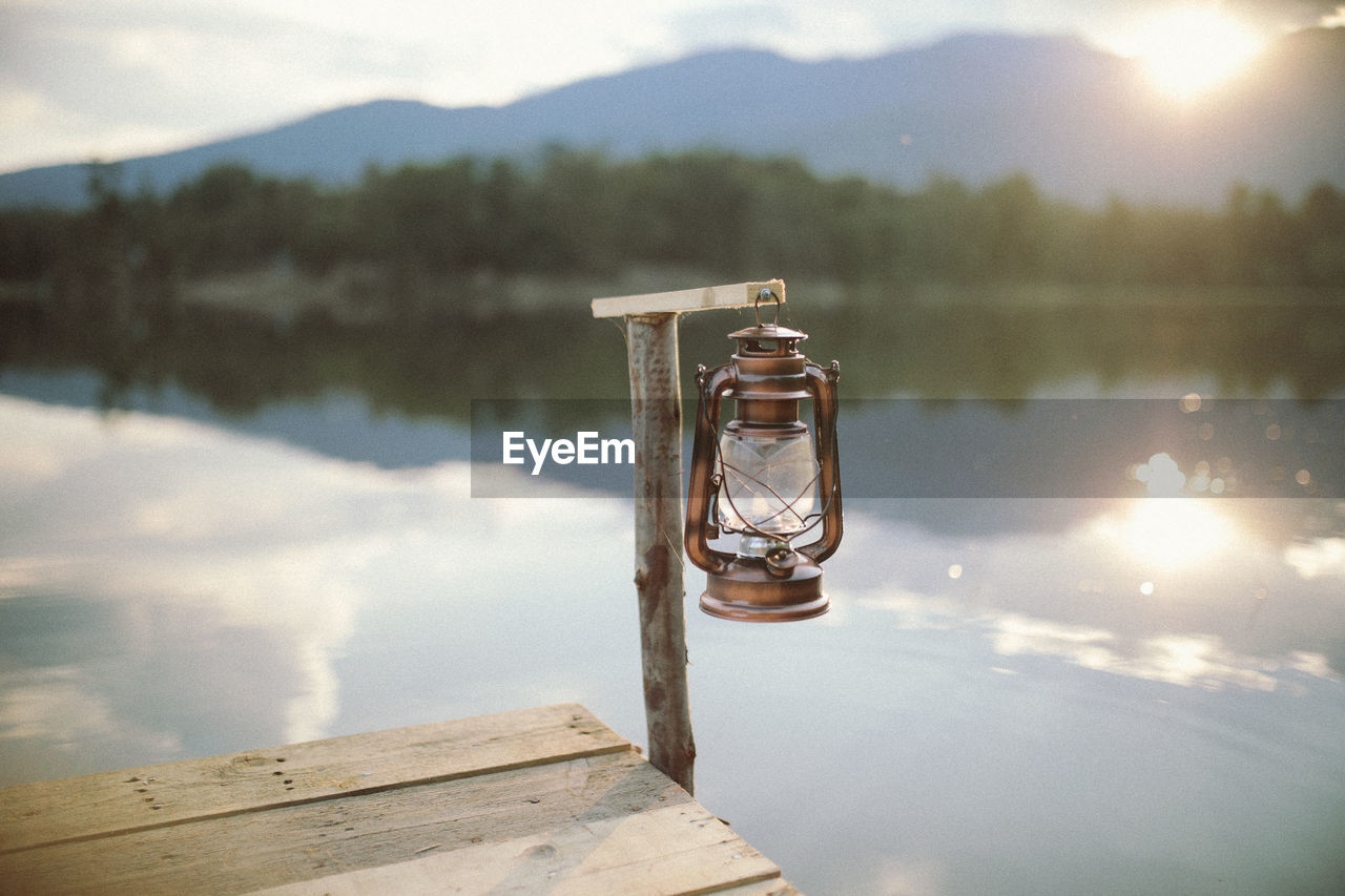 Close-up of water in lake against mountains