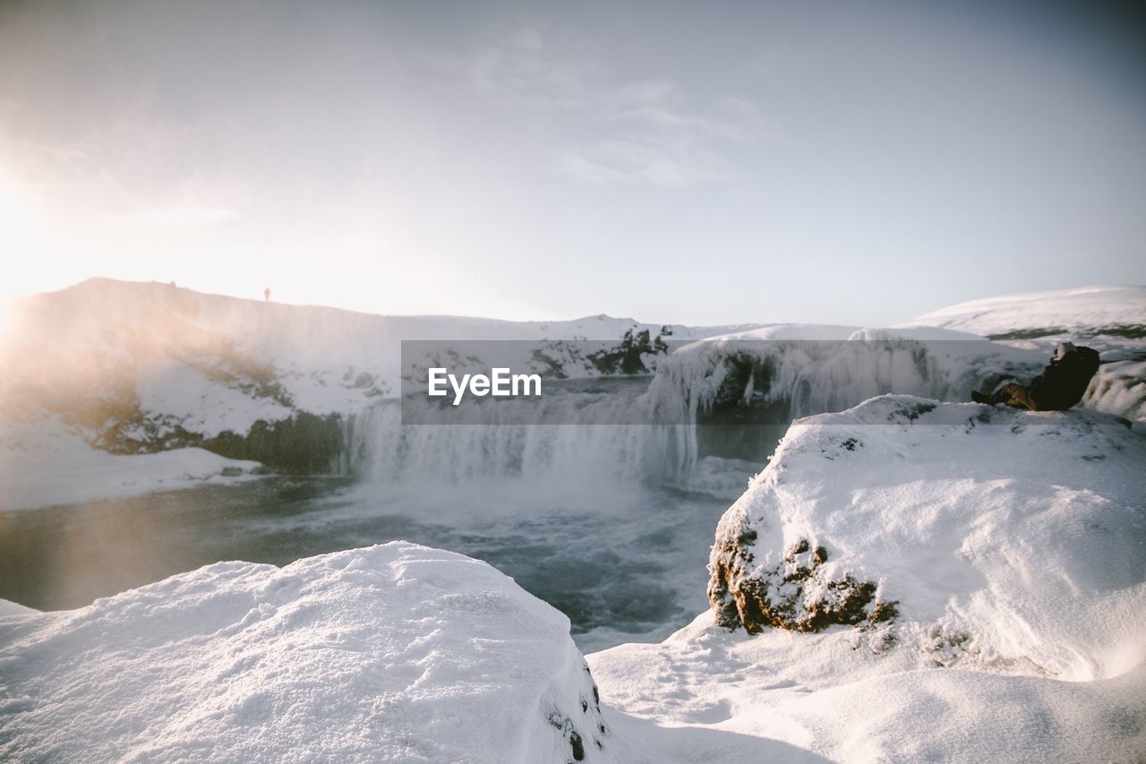 VIEW OF SNOWCAPPED MOUNTAINS AGAINST SKY