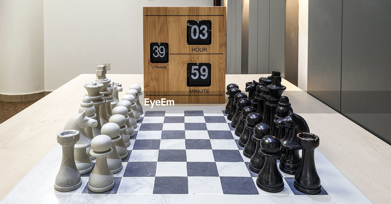 VIEW OF CHESS PIECES ON TABLE