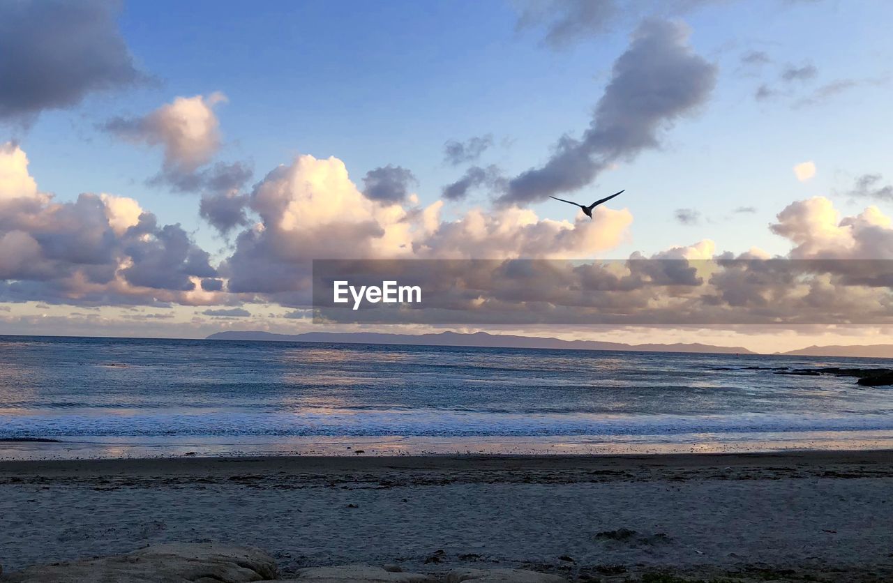SCENIC VIEW OF SEA DURING SUNSET