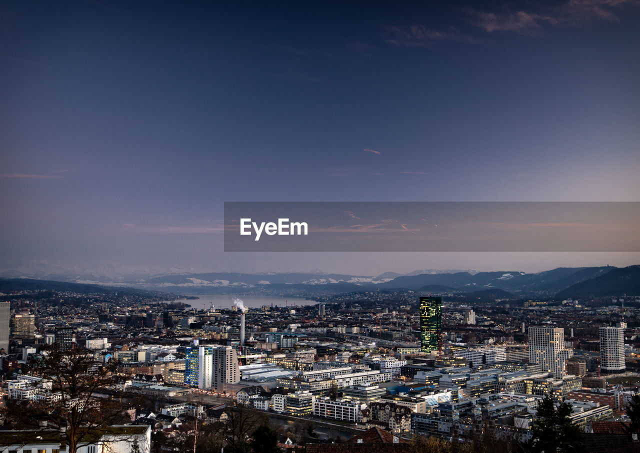 High angle view of townscape against sky at dusk