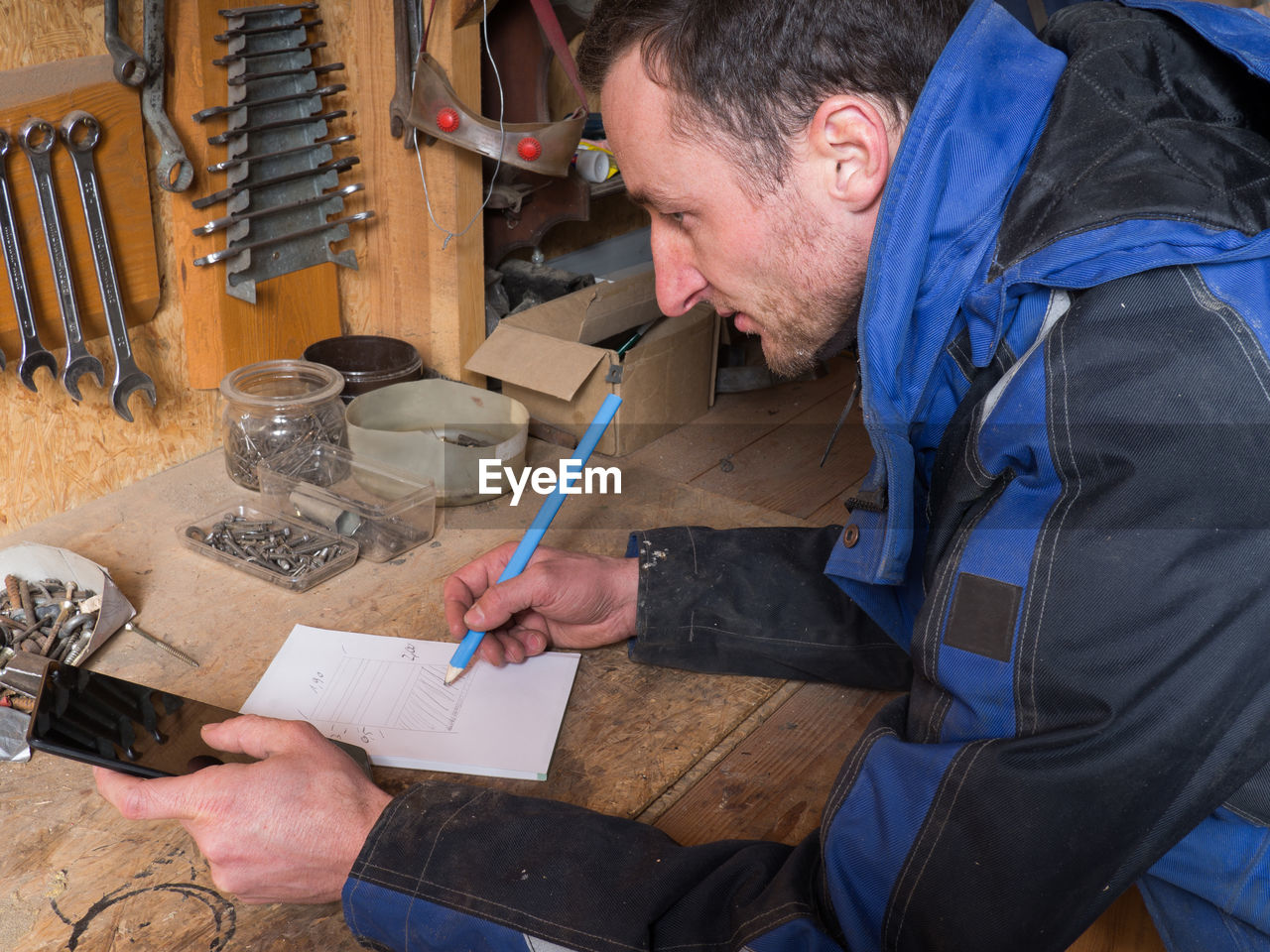 Carpenter working at workbench