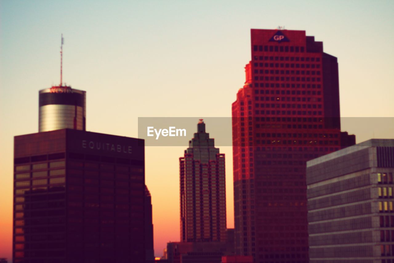 LOW ANGLE VIEW OF SKYSCRAPERS AGAINST SKY