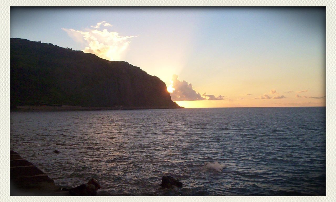 VIEW OF SEA AT SUNSET