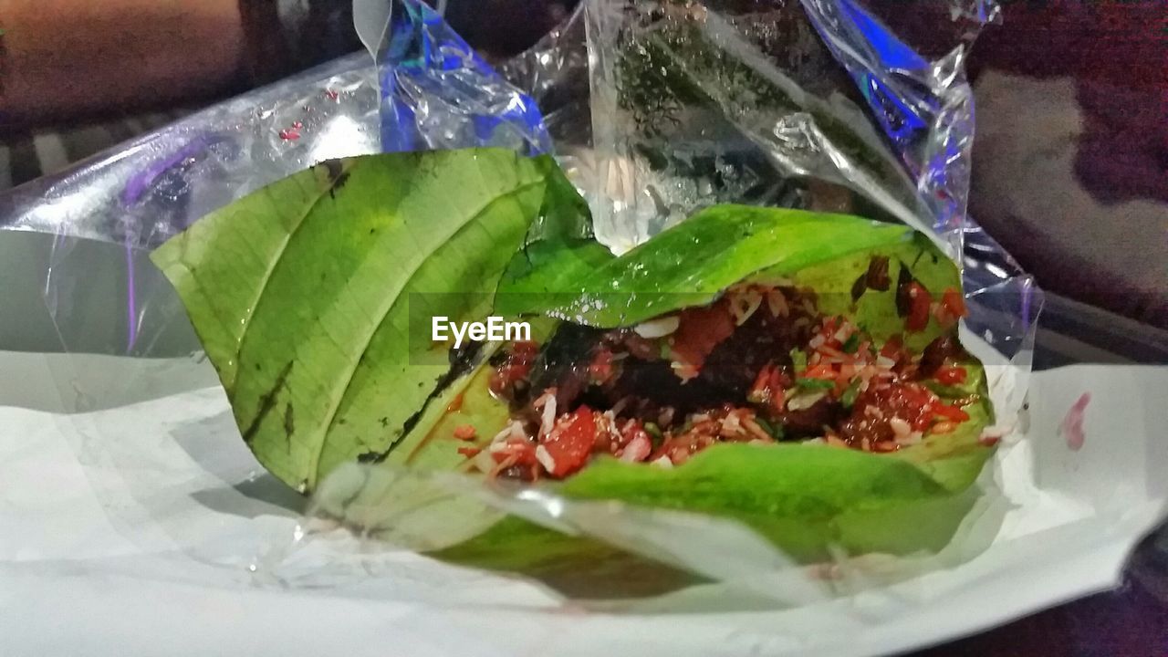 CLOSE-UP OF FOOD ON TABLE