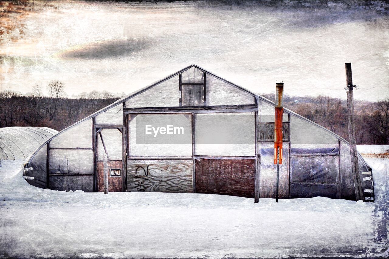 VIEW OF SNOW COVERED LANDSCAPE