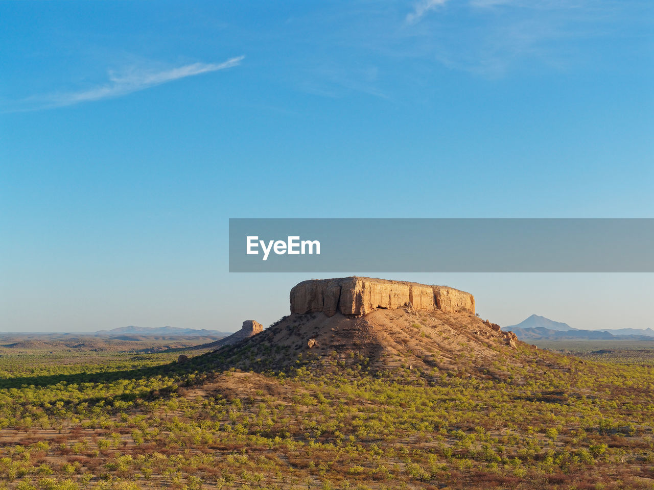 VIEW OF ROCK FORMATIONS ON LANDSCAPE AGAINST SKY