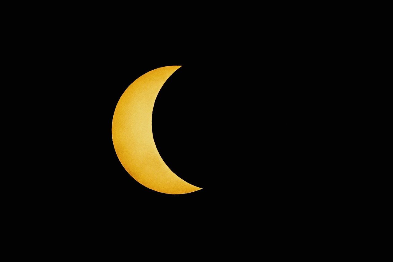 Partial phase of solar eclipse at night