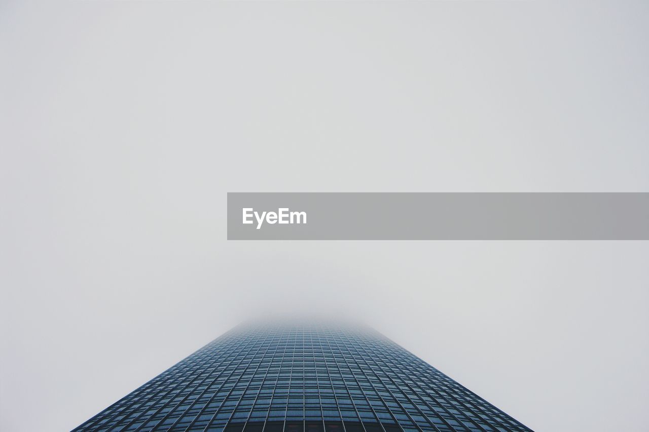 Low angle view of modern building against clear sky