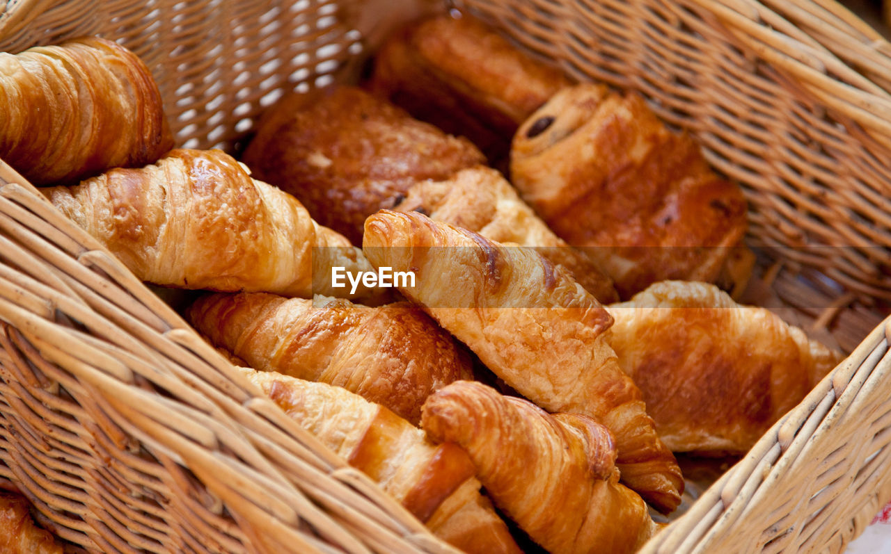 Freshly baked croissants in basket