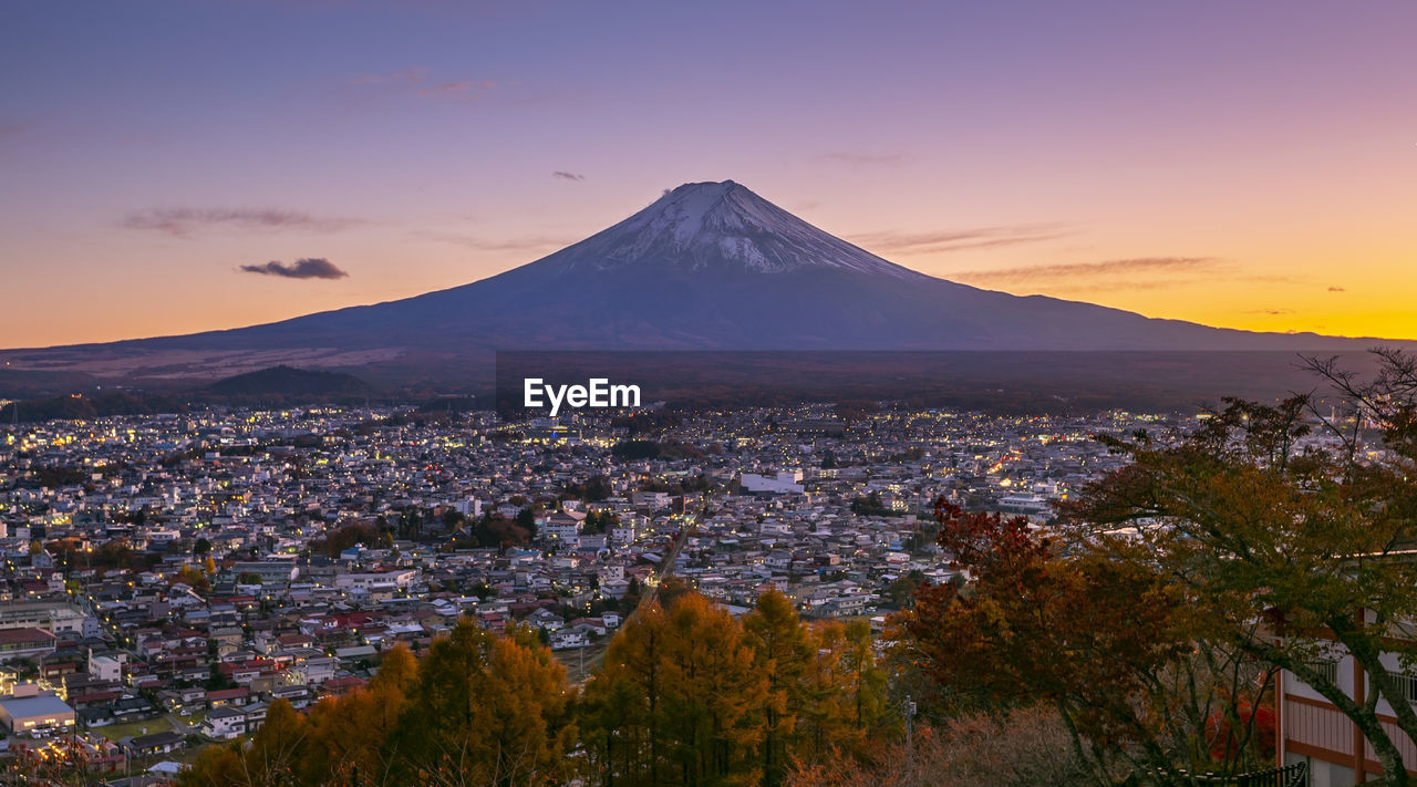 Aerial view of city against sky during sunset at fuji mount,japan