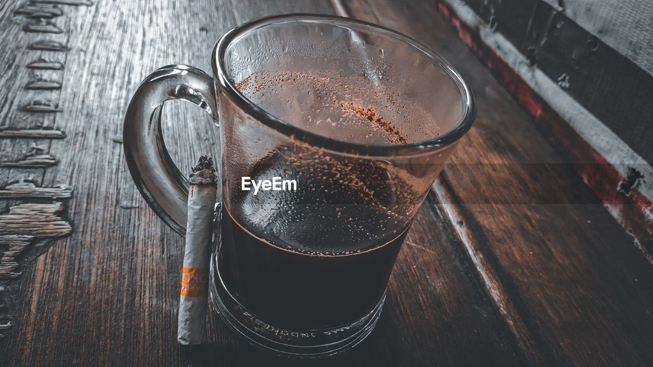 High angle view of coffee cup on table