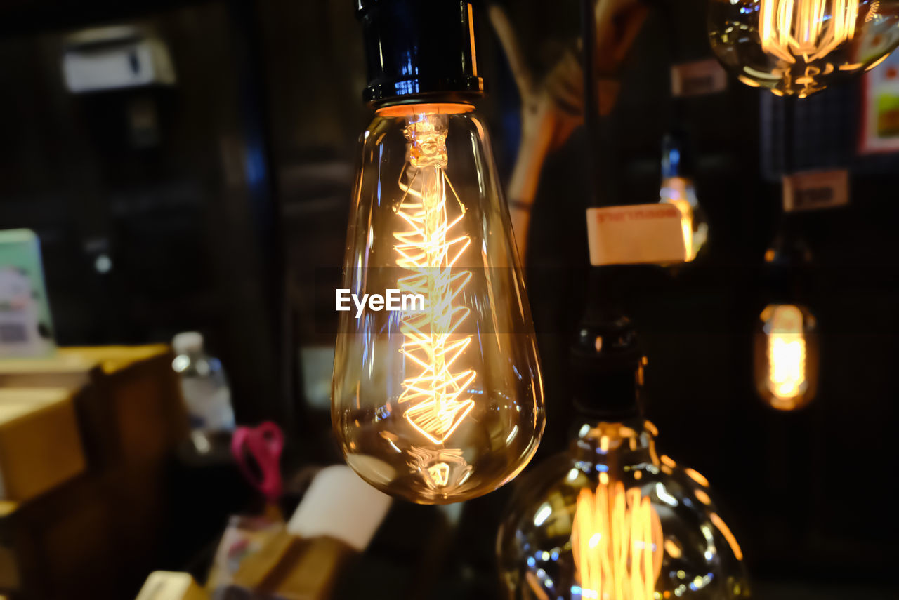 Close-up of illuminated light bulb