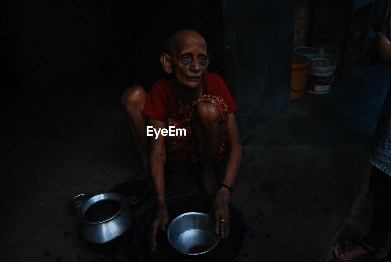 Portrait of an old  woman looking away