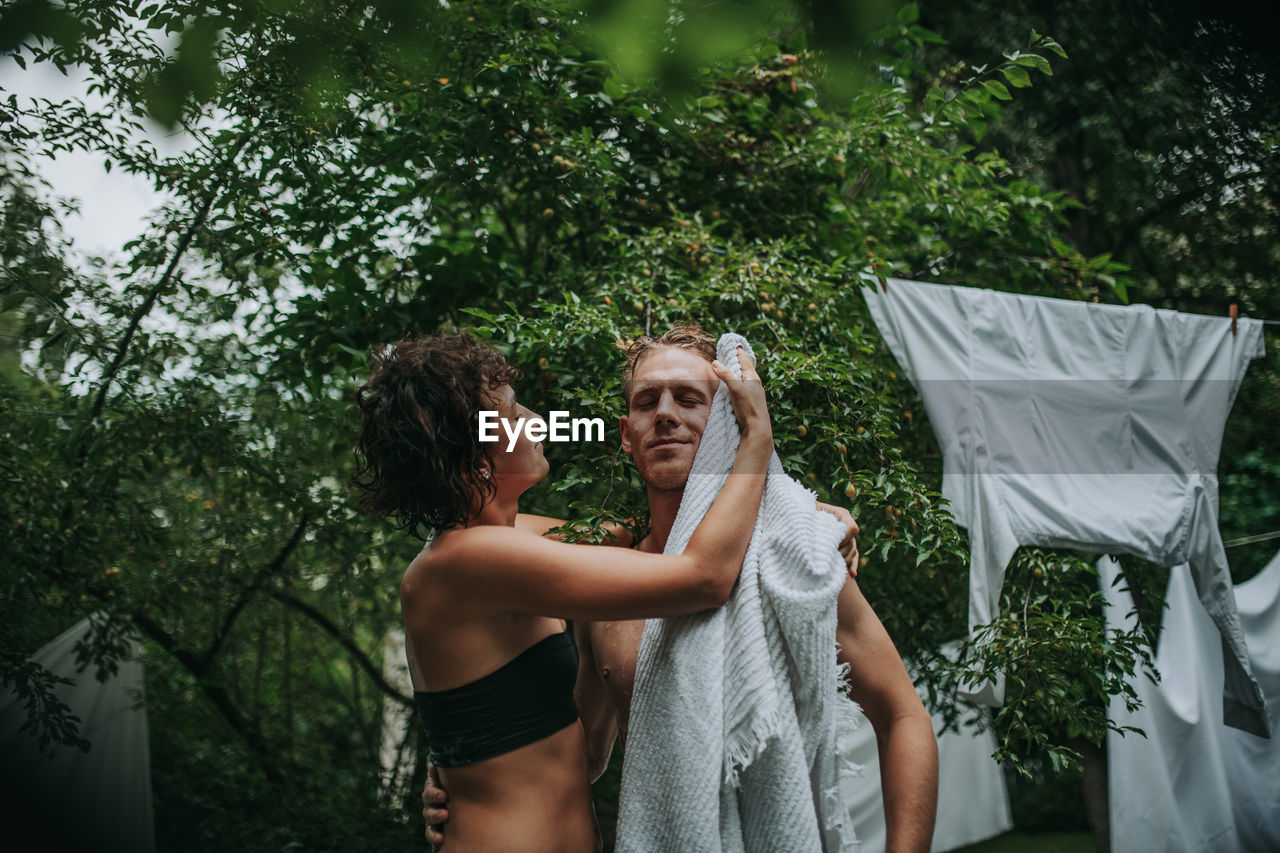 Young couple standing in park