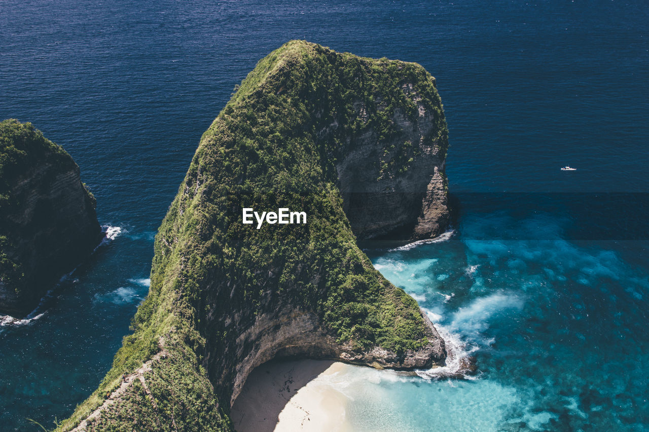 High angle view of rock in sea